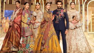 Pair a deep emerald, burgundy, or navy outfit with clean, structured tailoring rather than heavy embellishment this is where soft power dressing and Pakistani formal wear are converging most clearly.