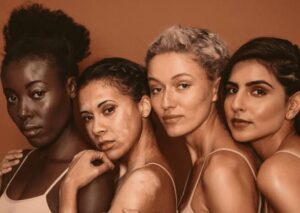 diverse group of people with different skin tones representing hyperpigmentation presentation
