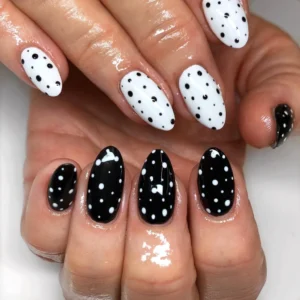 Classic black and white polka dot nails manicure